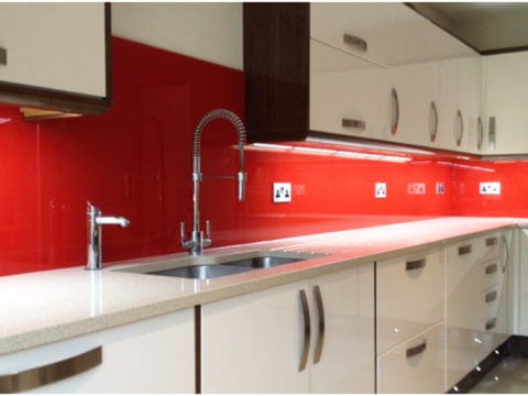red splashback prefrectly colour matched with white worktops