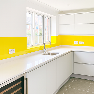 yellow kitchen glass splashback